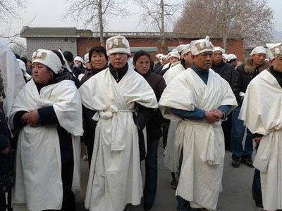 A group of people dressed in white